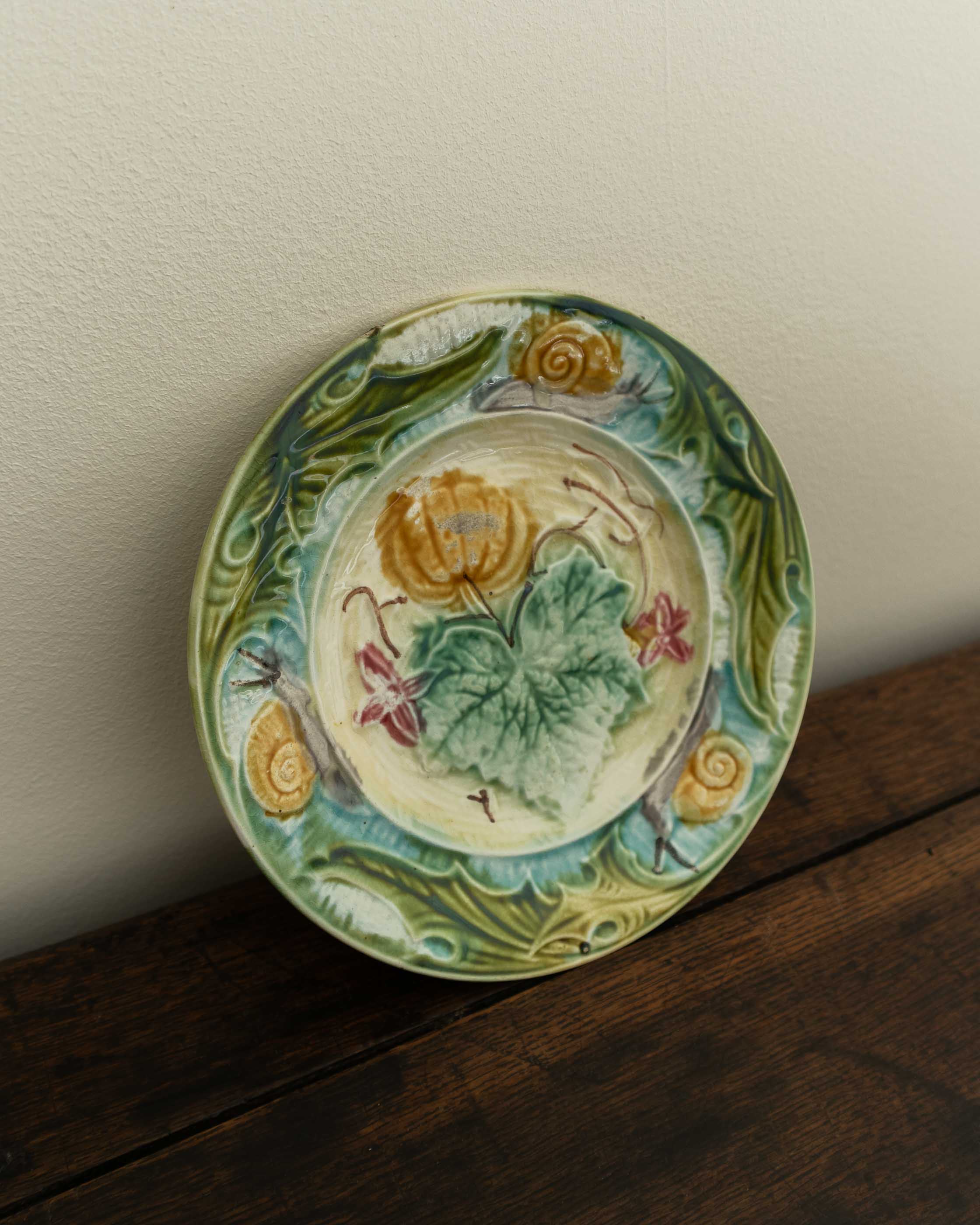 Decorative ceramic plate with floral patterns on a wooden surface