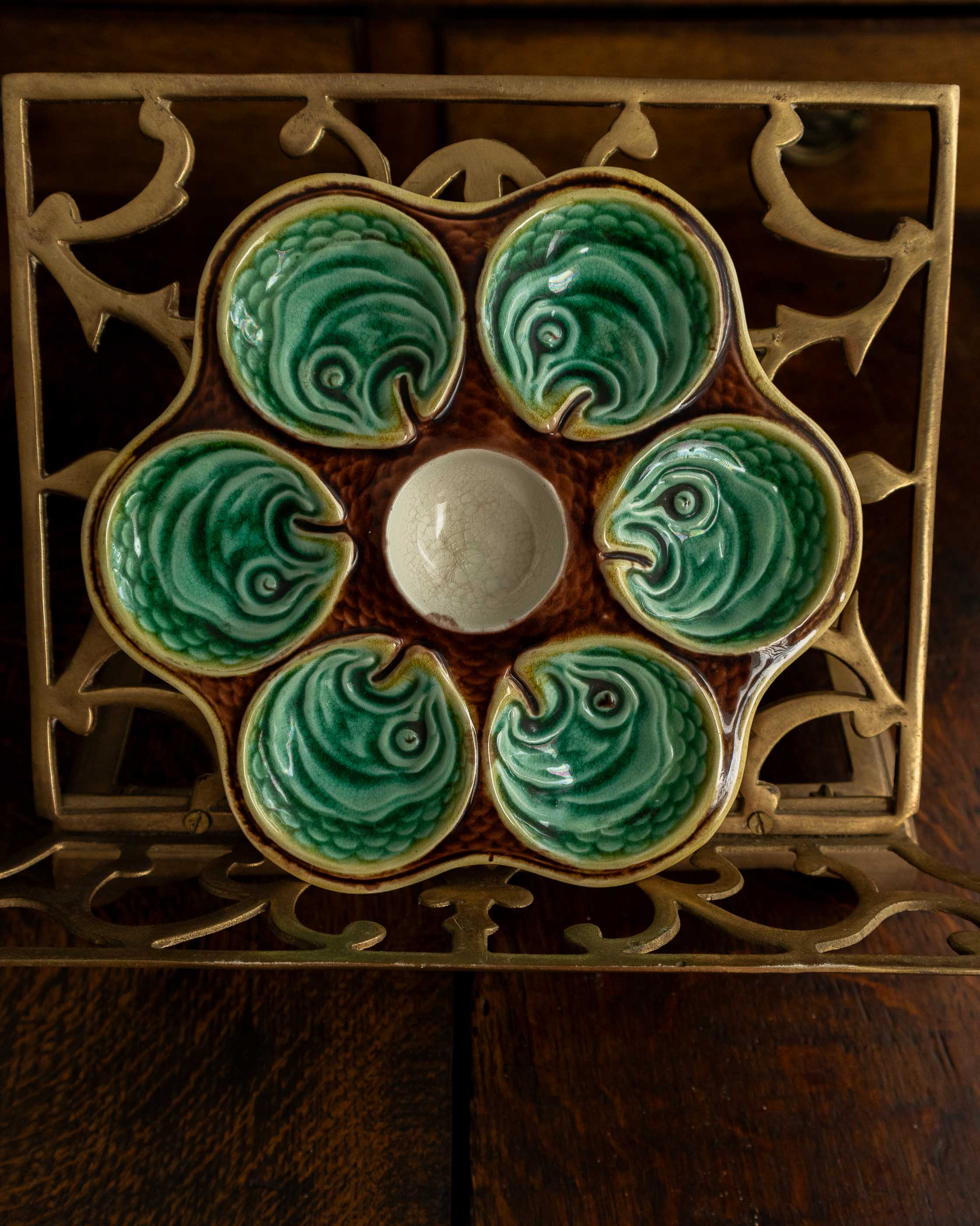 Ceramic oyster plate on a wooden surface