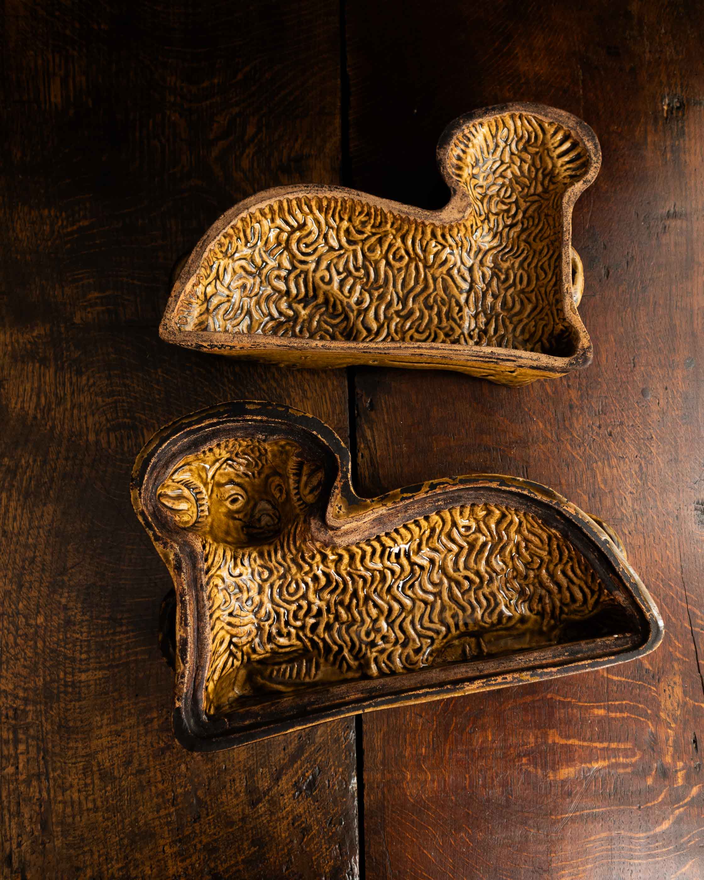 Decorative ceramic lamb mould on a wooden surface