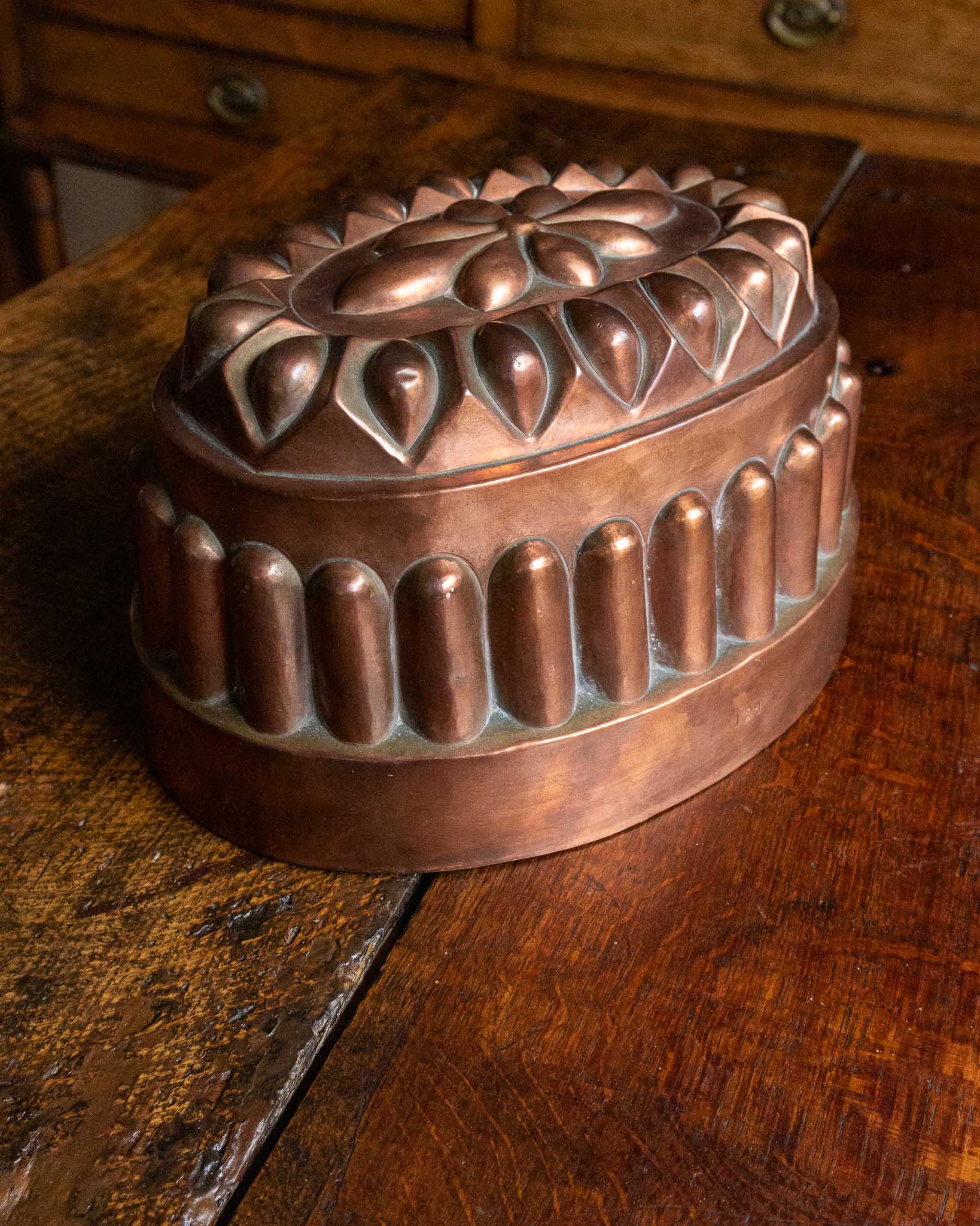 Copper mold on a wooden surface