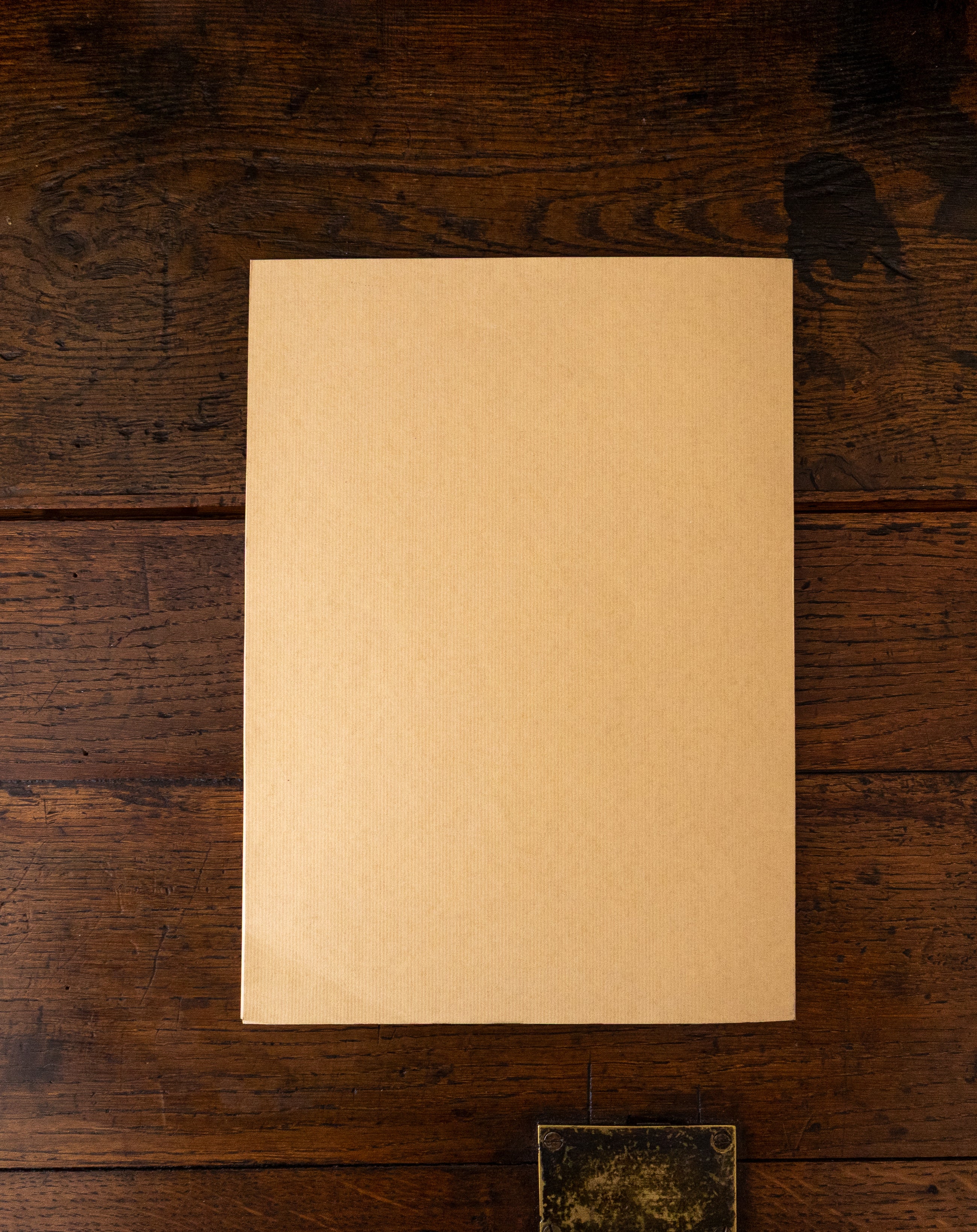 Back cover of a book on a wooden surface