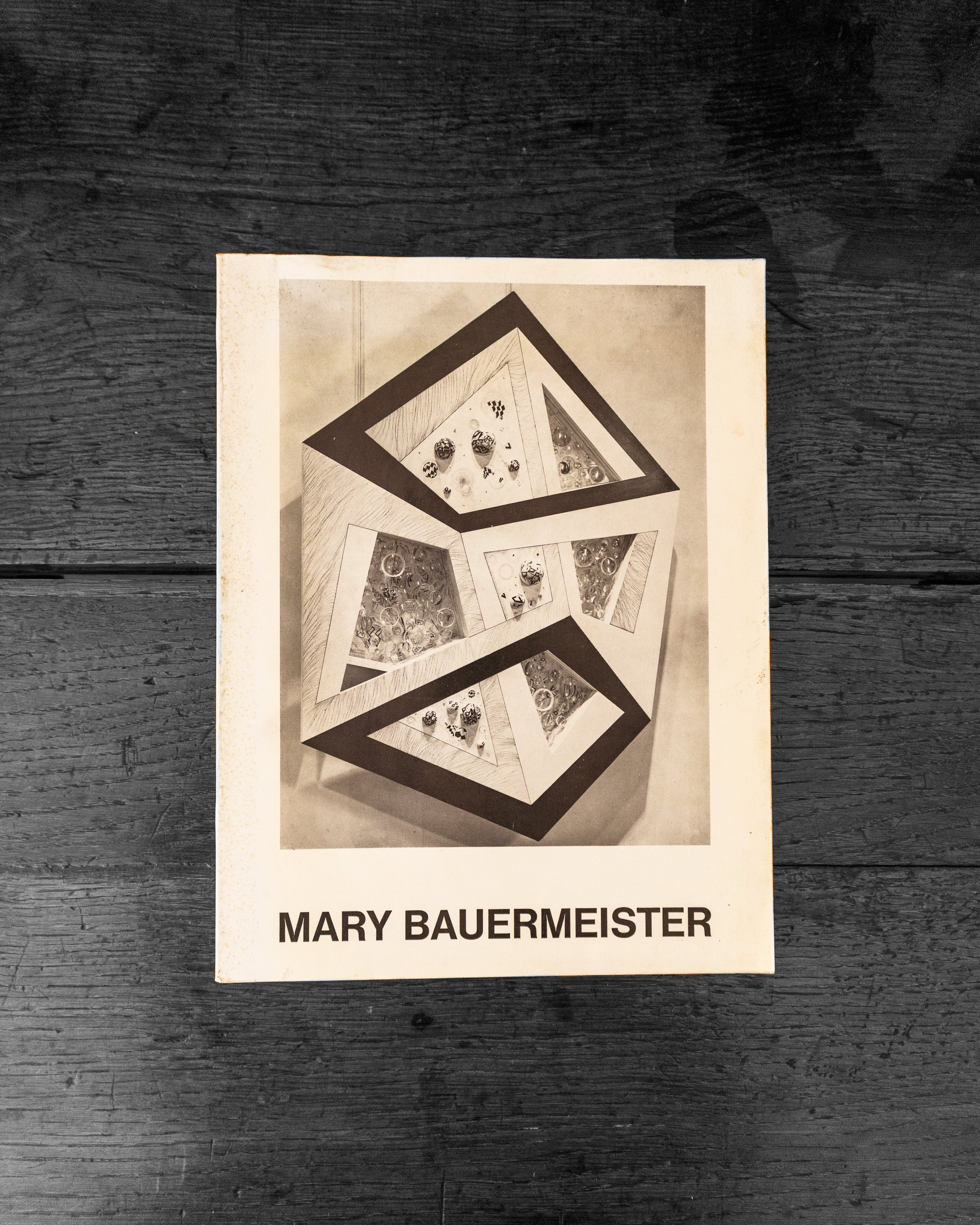 Cover of a book wooden surface with 'Mary Bauermeister' text.