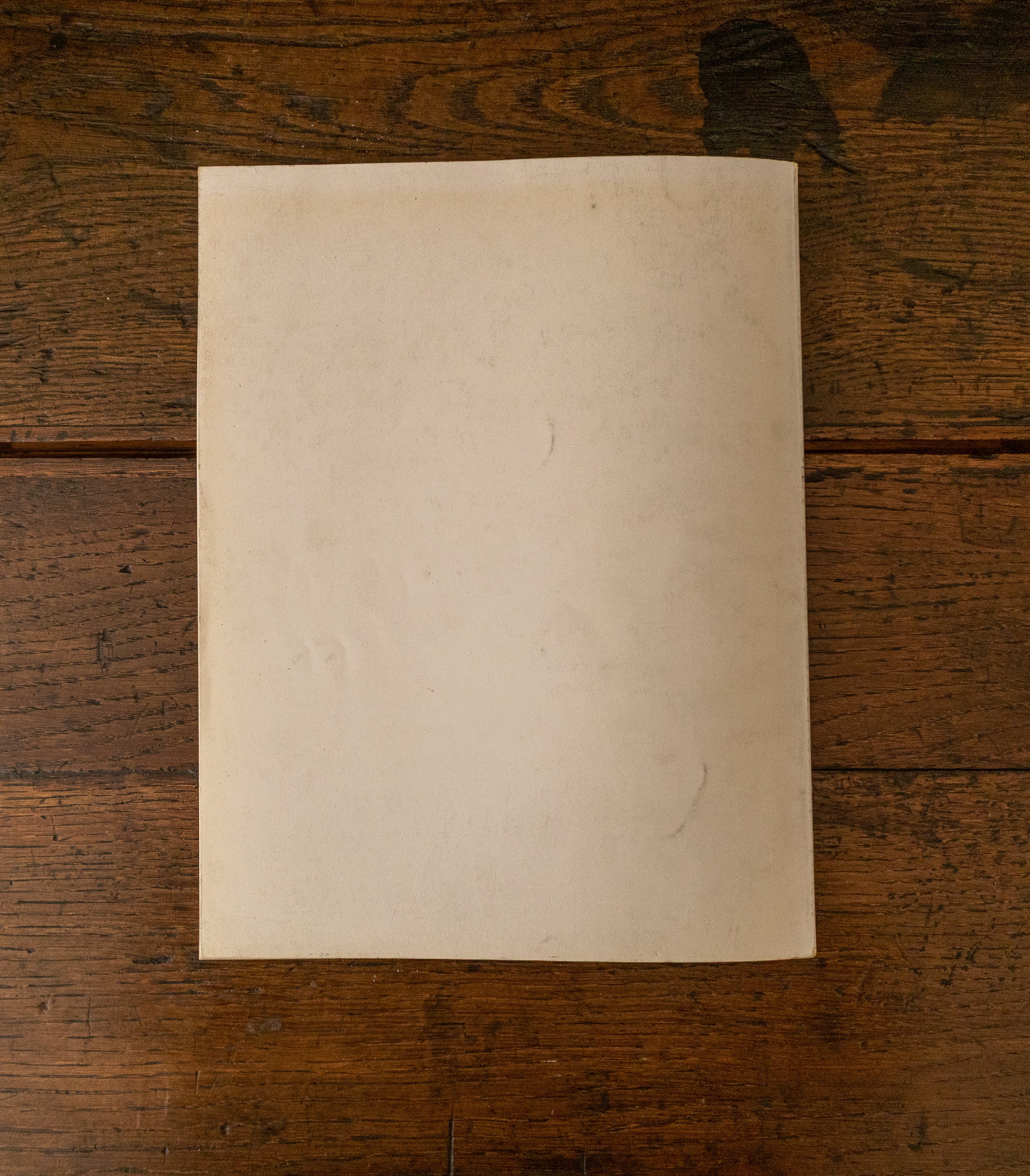 Back cover of book on a wooden surface