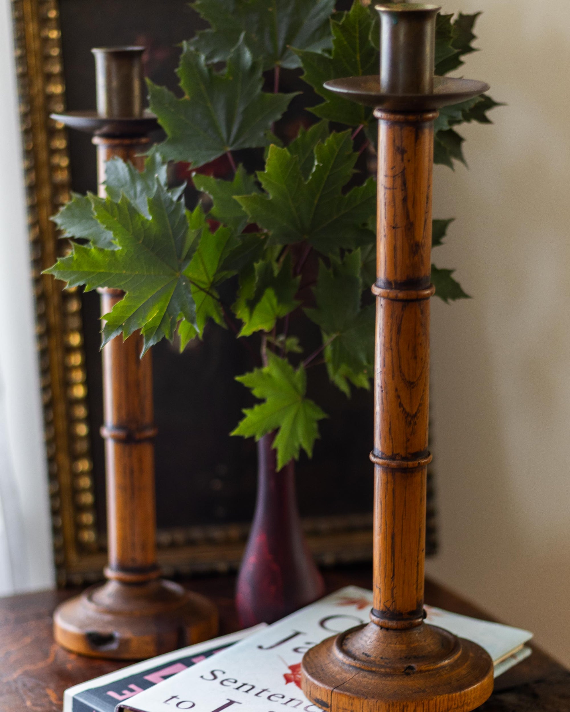 Wooden candlesticks with a decorative background