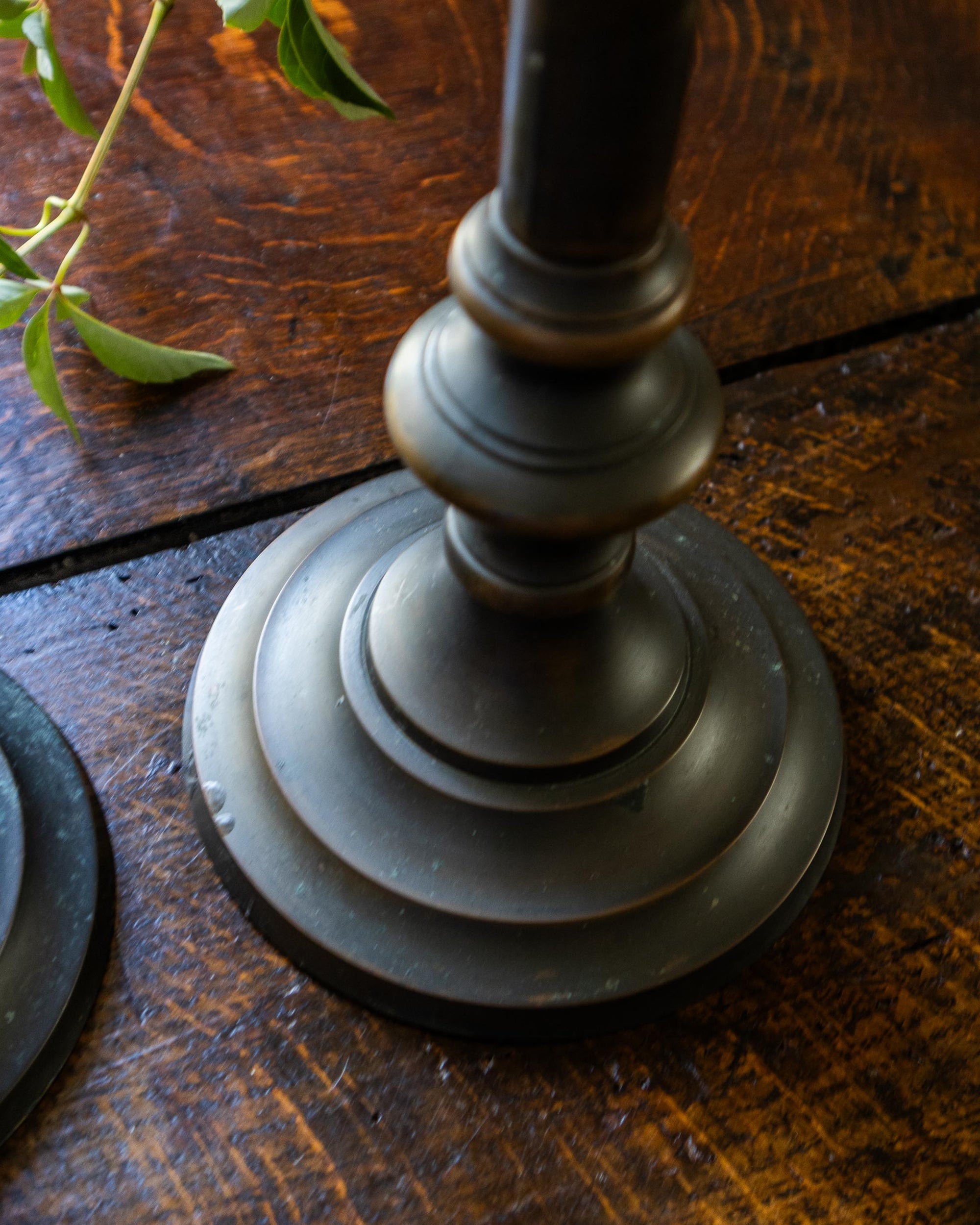 Decorative candlestick on a wooden surface