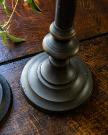 Decorative candlestick on a wooden surface