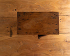Wooden cabinet on a wooden surface