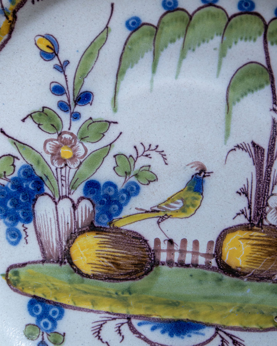 Decorative ceramic plate with floral and bird design