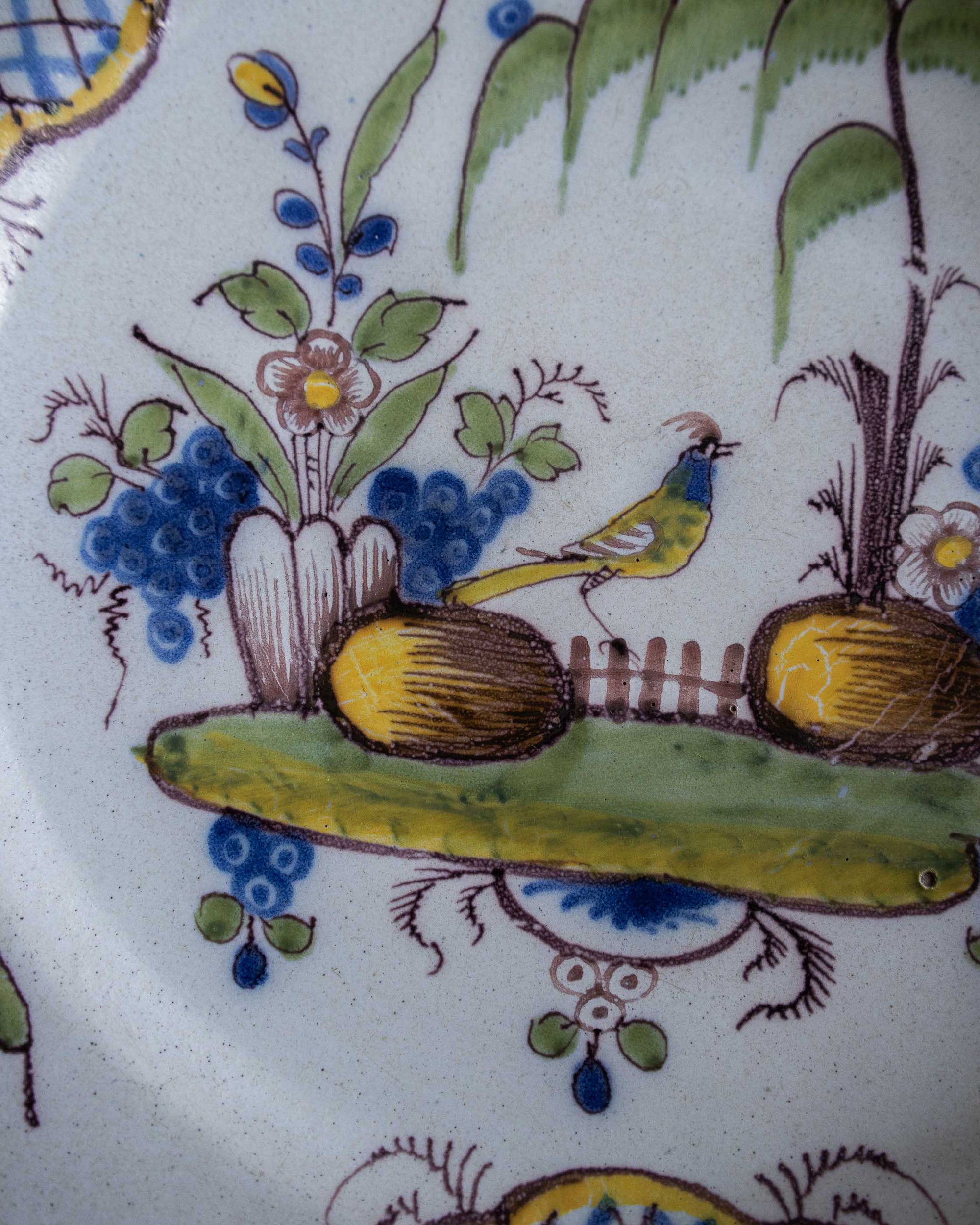 Decorative ceramic plate with floral and bird design