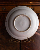 White ceramic plate on a wooden surface