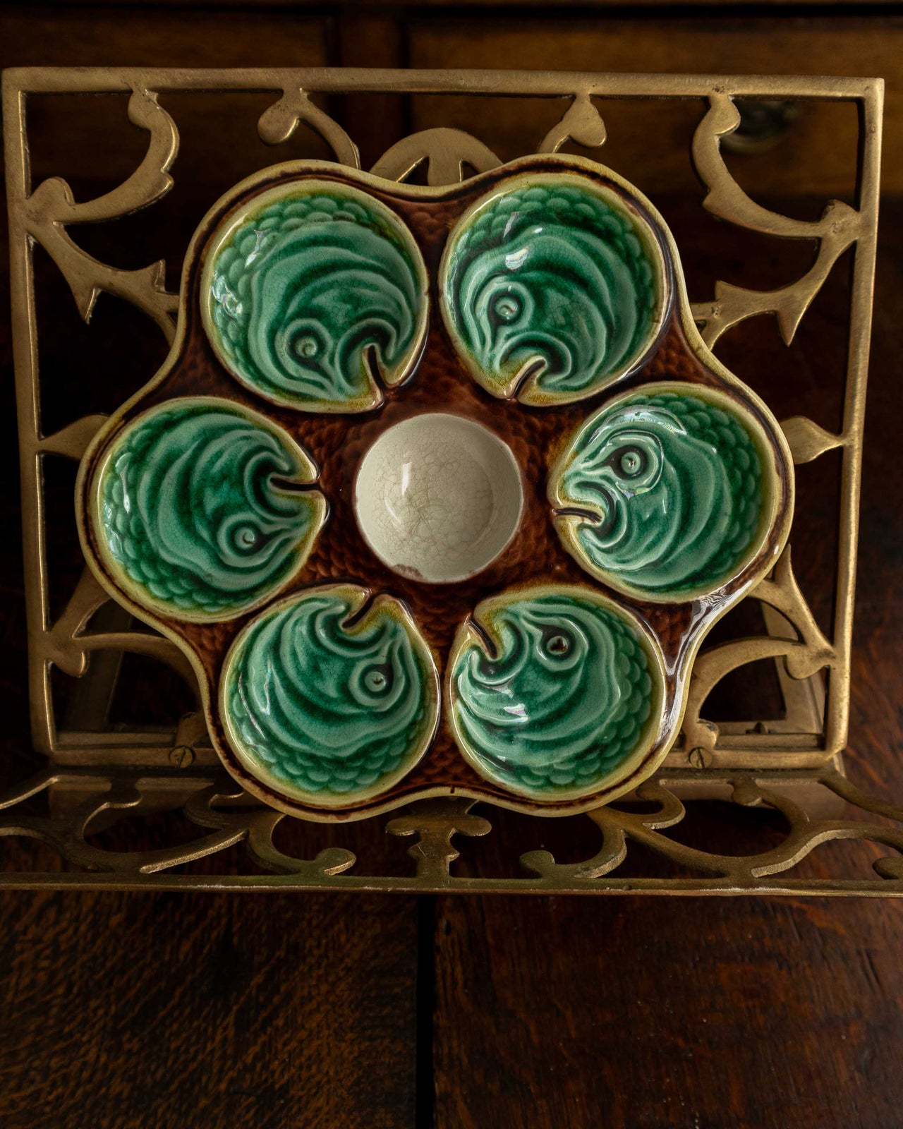 Ceramic oyster plate on a wooden surface