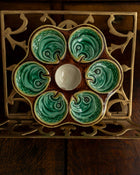 Ceramic oyster plate on a wooden surface