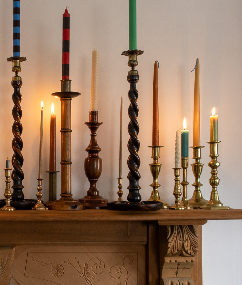 Antique brass and wooden candlesticks
