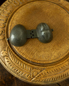 Walnut pewter ice cream mould on wooden breadboard