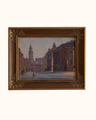 Framed painting of a city street scene with ornate gold frame