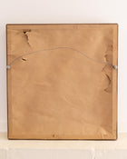 Back of a painting with signature and date on a beige background