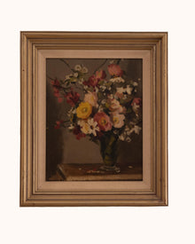 Framed still life painting of flowers with a brown frame on a white background