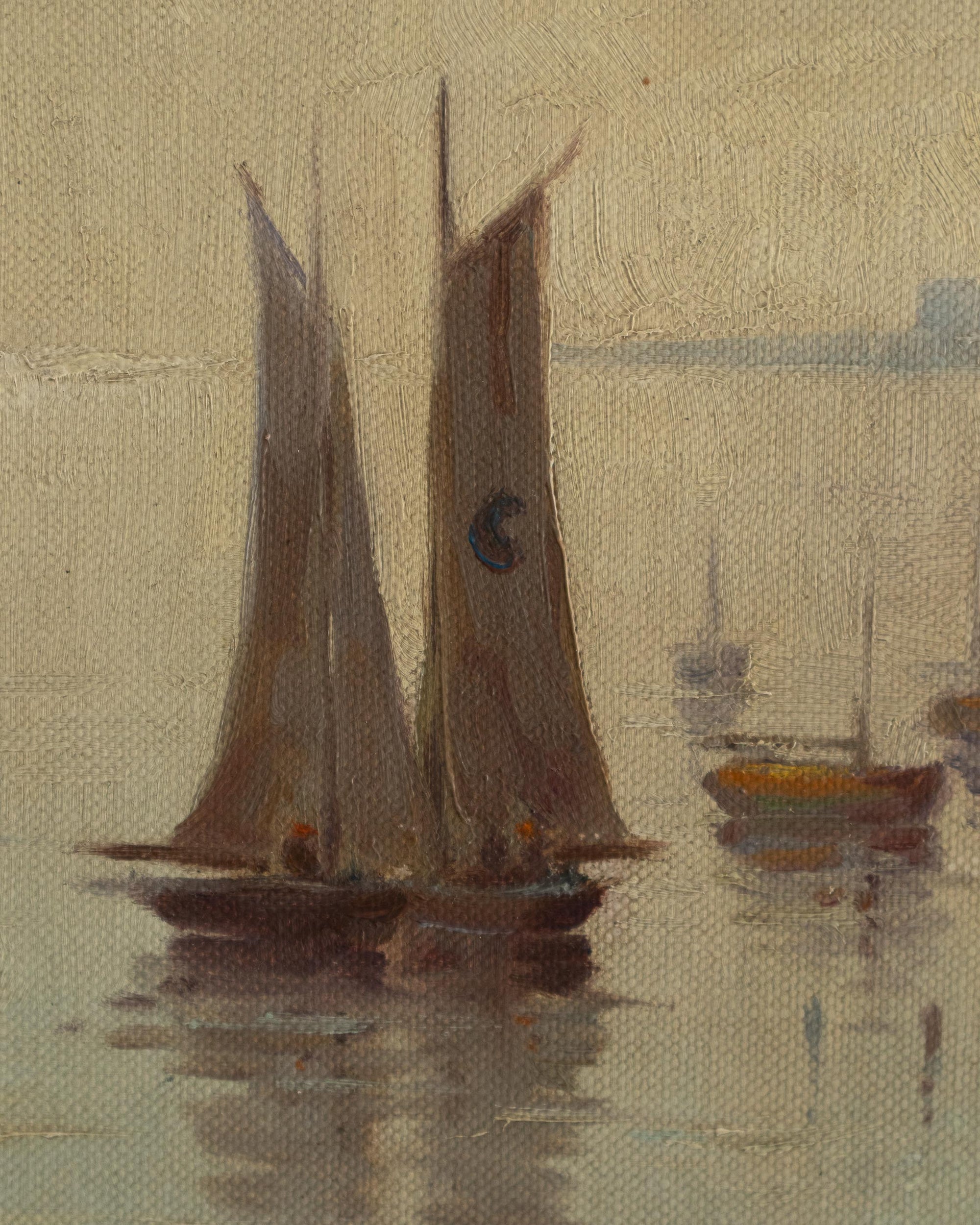Two sailboats with brown sails on a calm water surface, textured beige background