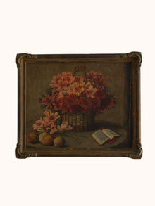 Vintage still life painting with flowers, fruits, and a book in a decorative frame.