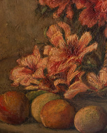 Close-up of a still life painting with flowers and fruits on a textured surface