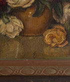 Close-up of a painting with flowers and a woven basket