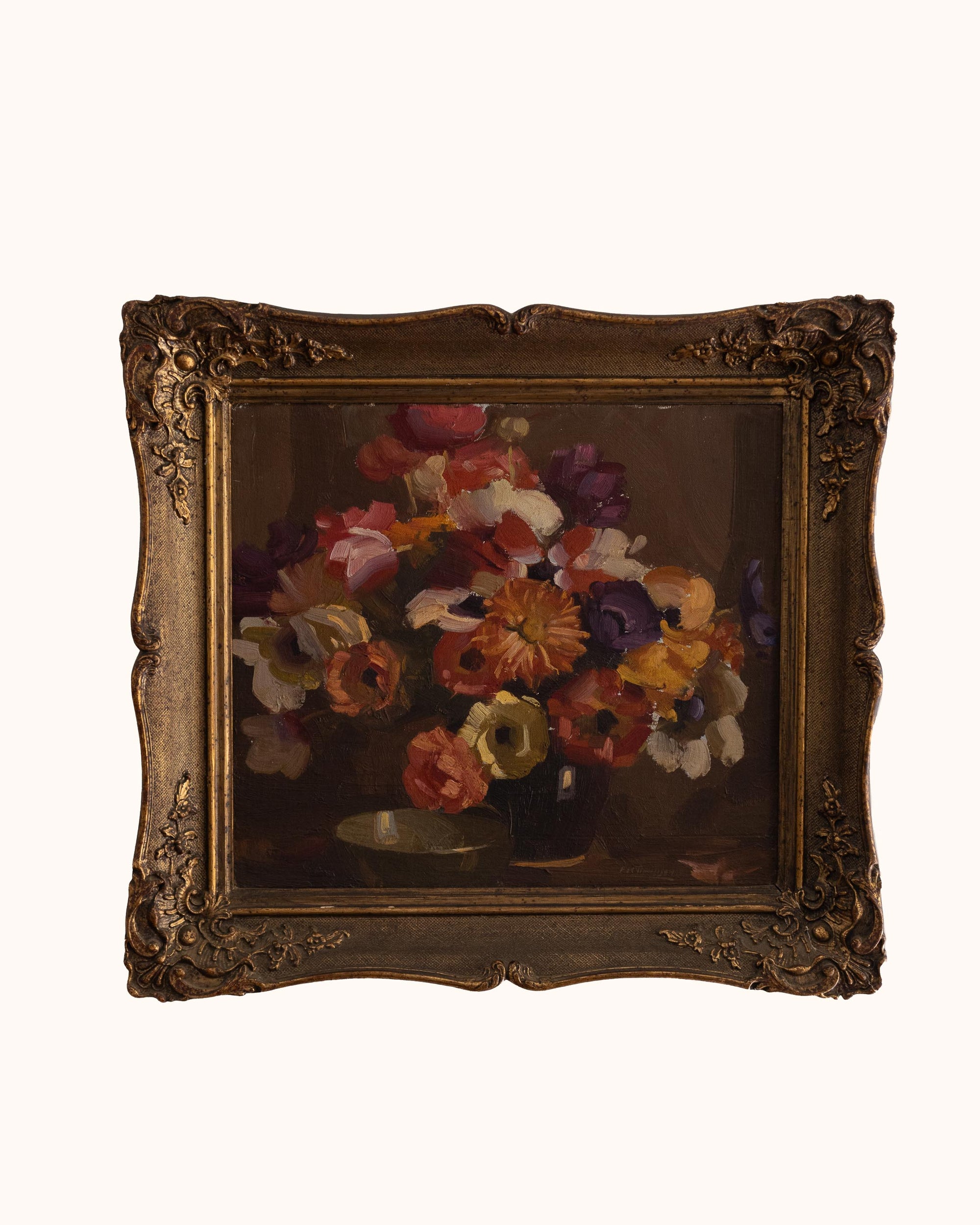 Framed painting of a still life with flowers on a white background