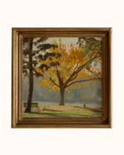 Painting of a tree with yellow leaves in a gold frame on a white background
