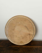 Wooden breadboard on a wooden surface