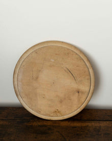 Wooden breadboard on a wooden surface