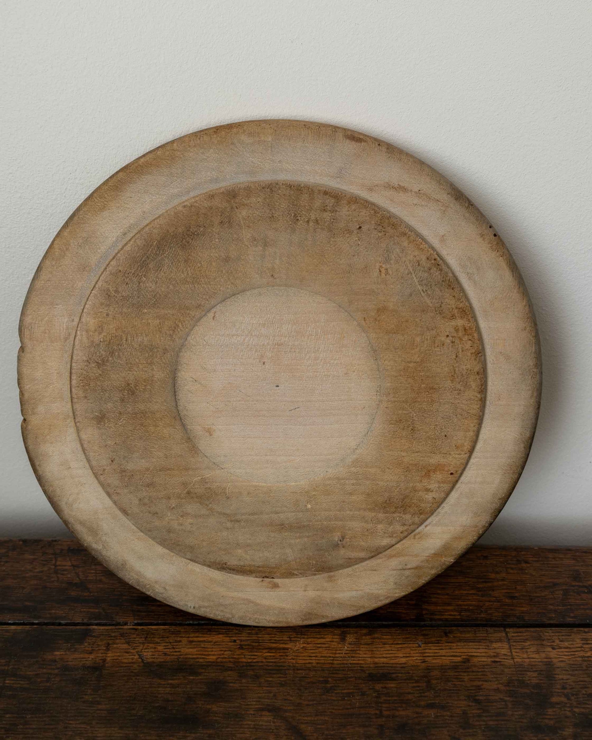 Wooden breadboard on a wooden surface
