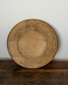 Wooden breadboard on a wooden surface