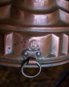 Copper mould on a wooden surface