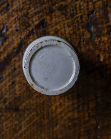 Ceramic pot on a wooden surface