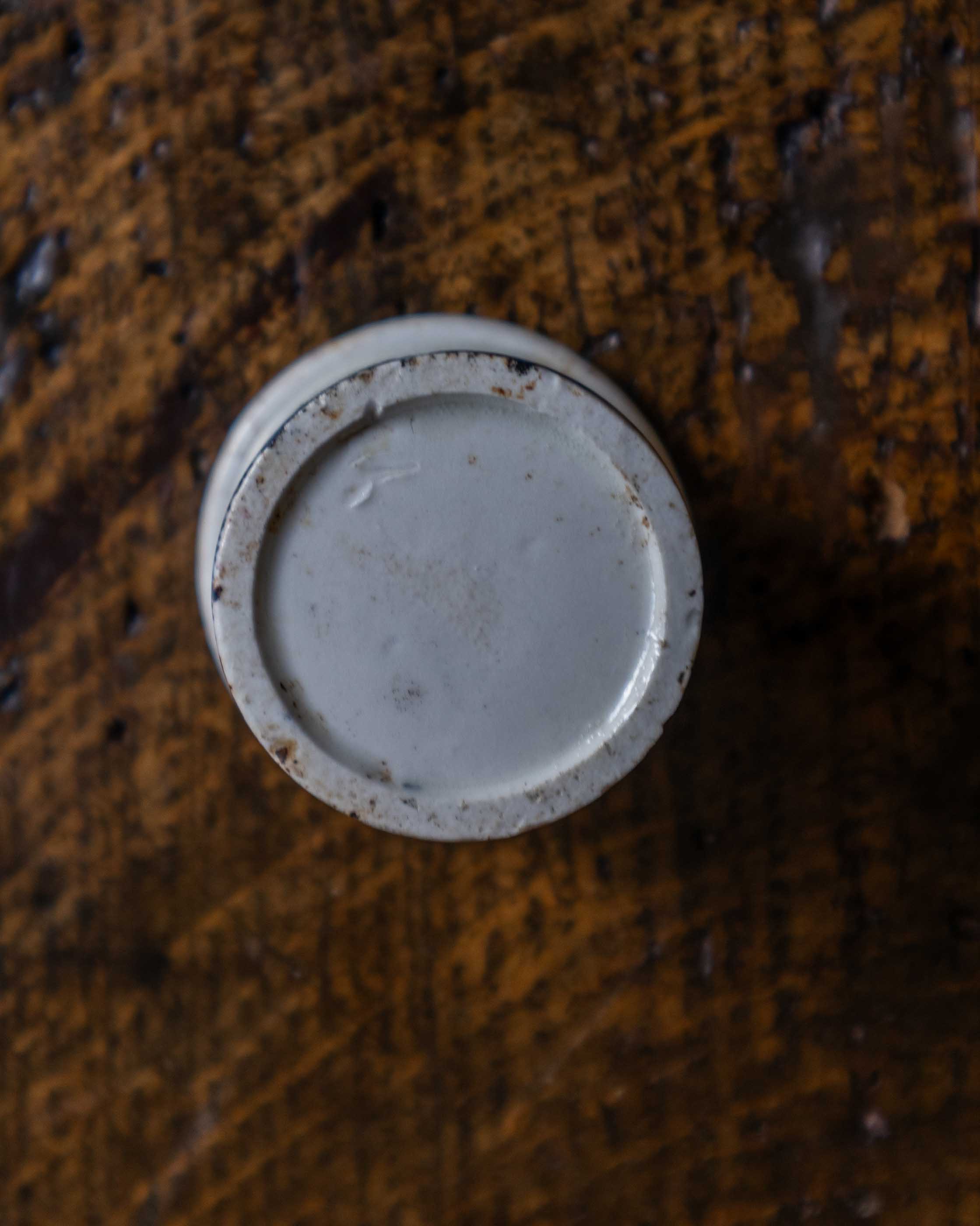 Ceramic pot on a wooden surface
