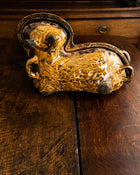 Decorative ceramic lamb mould on a wooden surface