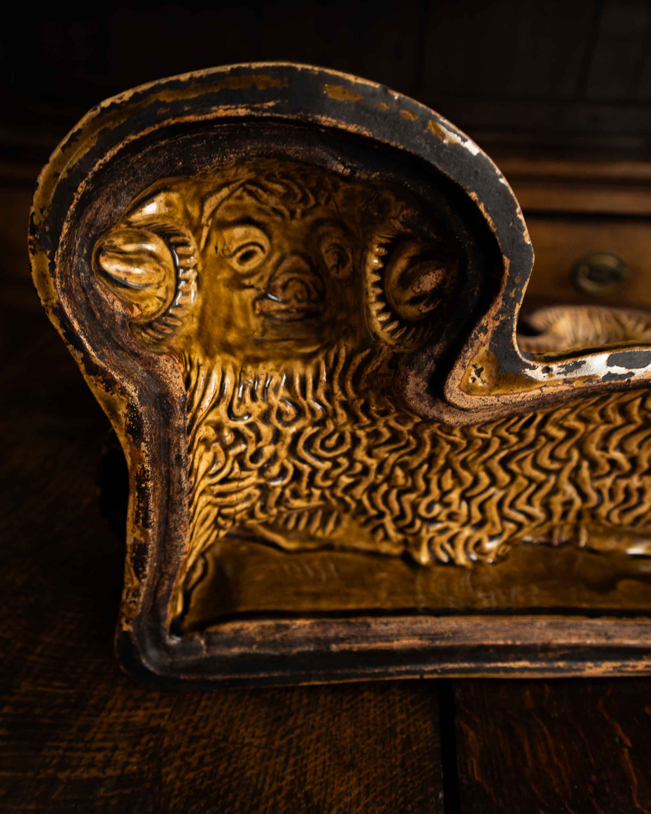 Decorative ceramic lamb mould on a wooden surface