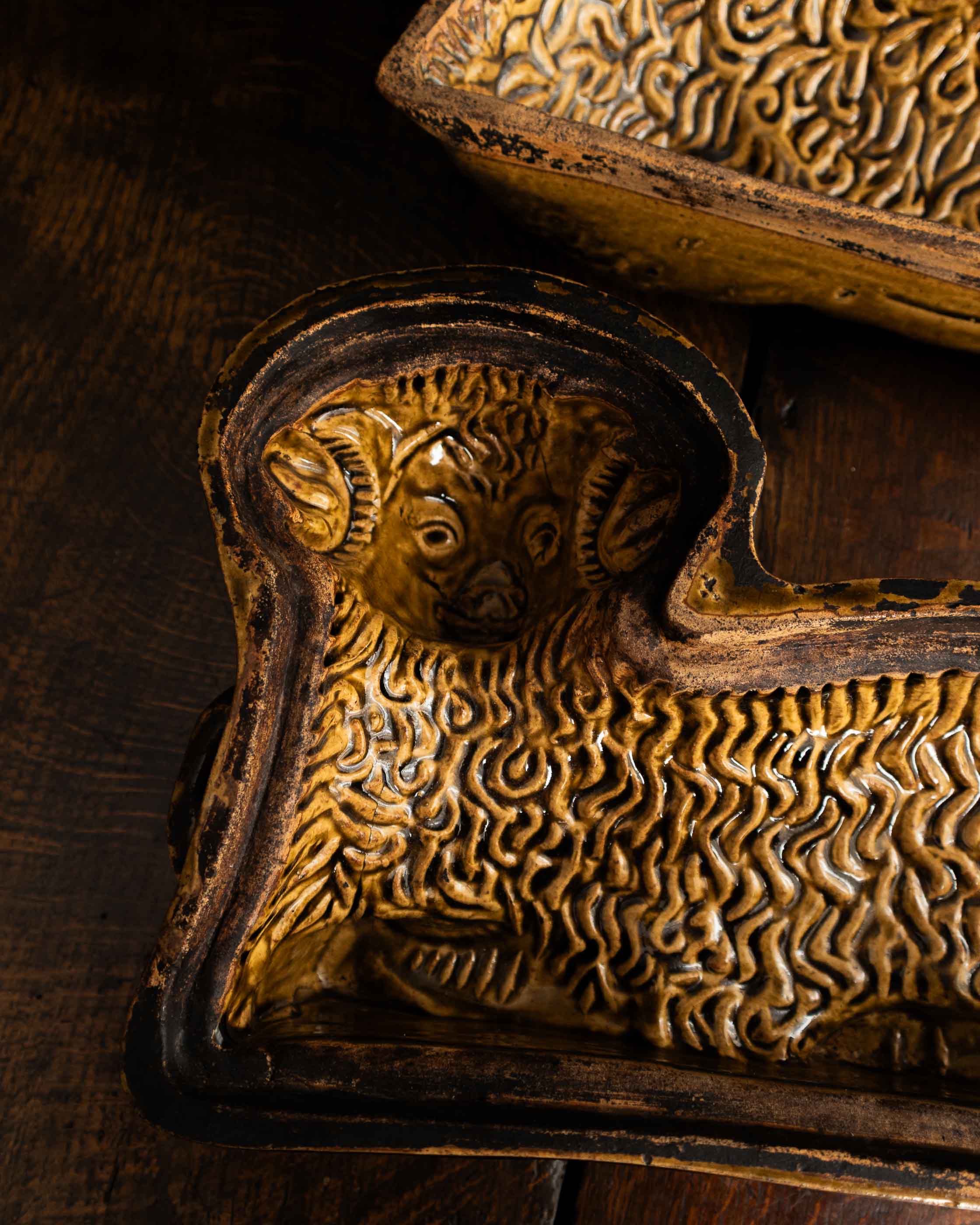 Decorative ceramic lamb mould on a wooden surface