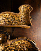 Decorative ceramic lamb mould on a wooden surface