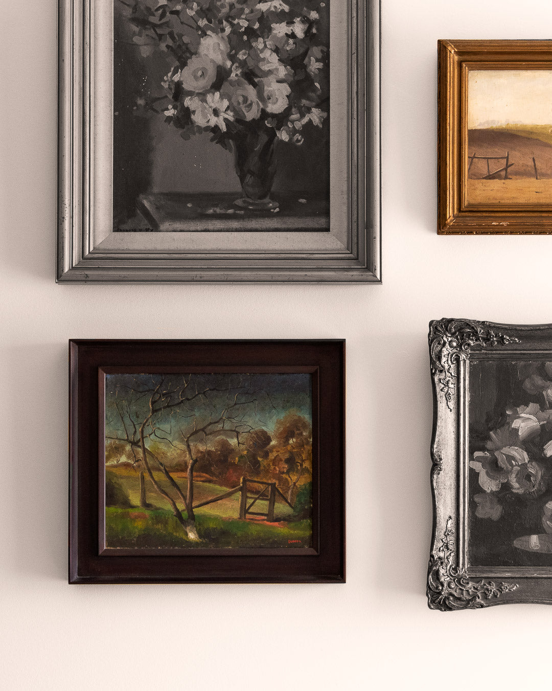 Paintings on a white wall