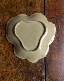 Wedgwood ceramic dish on a wooden surface