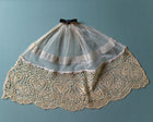 Lace jabot with a blue background