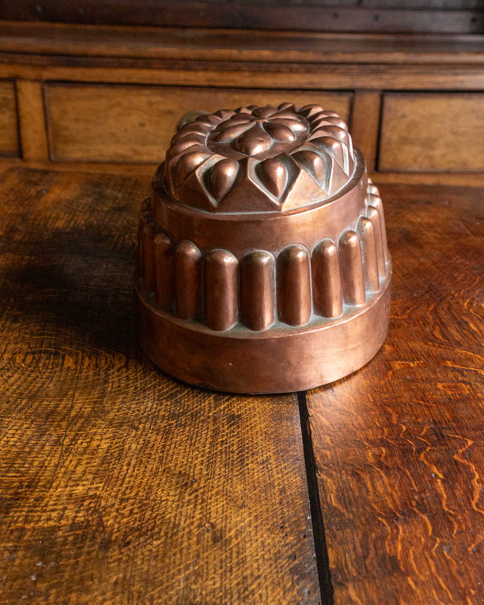 Copper mold on a wooden surface