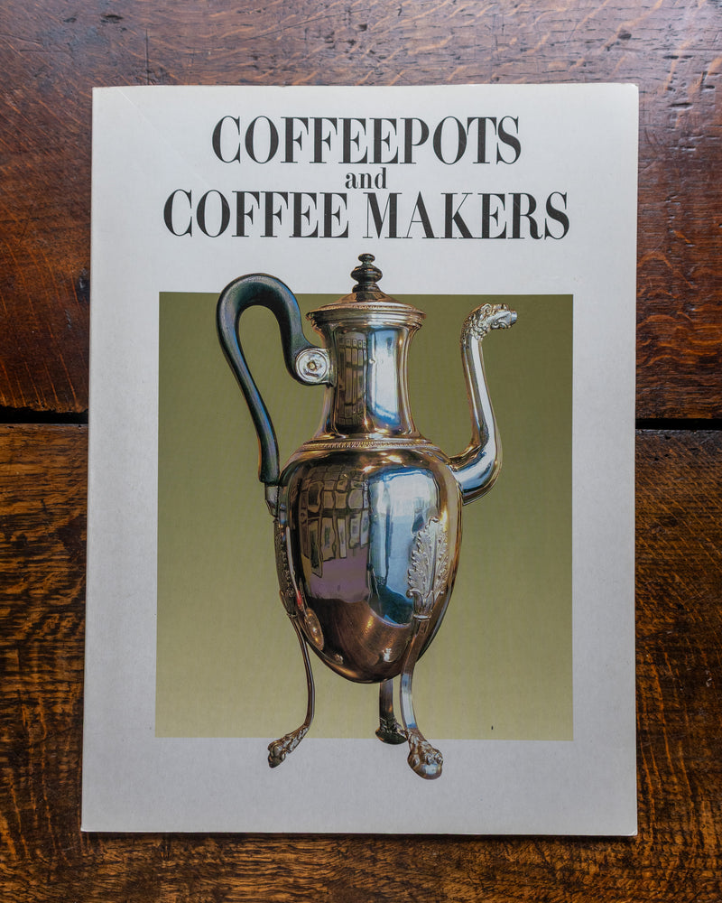 Book cover titled 'Coffeepots and Coffee Makers' with an illustration of a silver coffee pot on a wooden surface.