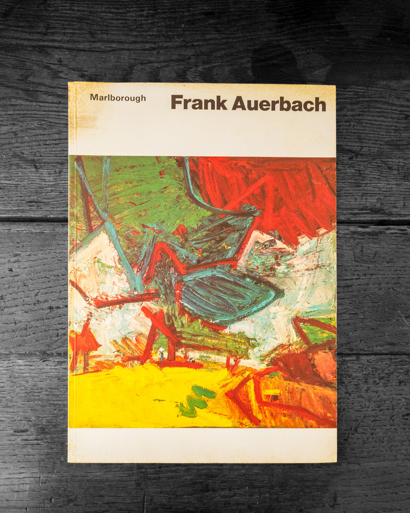 Book cover of 'Frank Auerbach' with abstract art design on a dark wooden surface