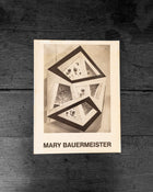 Cover of a book wooden surface with 'Mary Bauermeister' text.