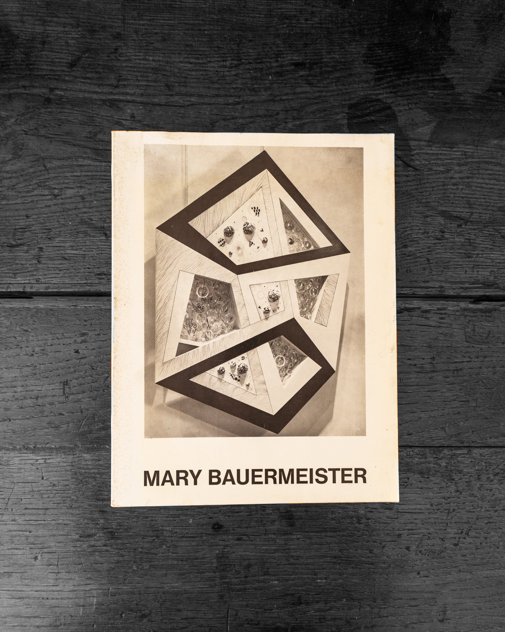 Cover of a book wooden surface with 'Mary Bauermeister' text.