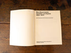 Open book with text on a wooden surface